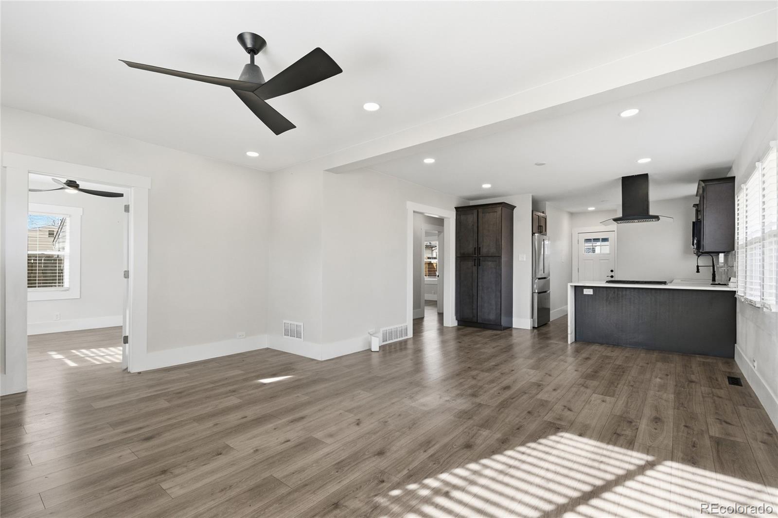 3417 West Alaska Place Denver, CO 80219 - Photo 10 of 30 a view of kitchen with sink and refrigerator