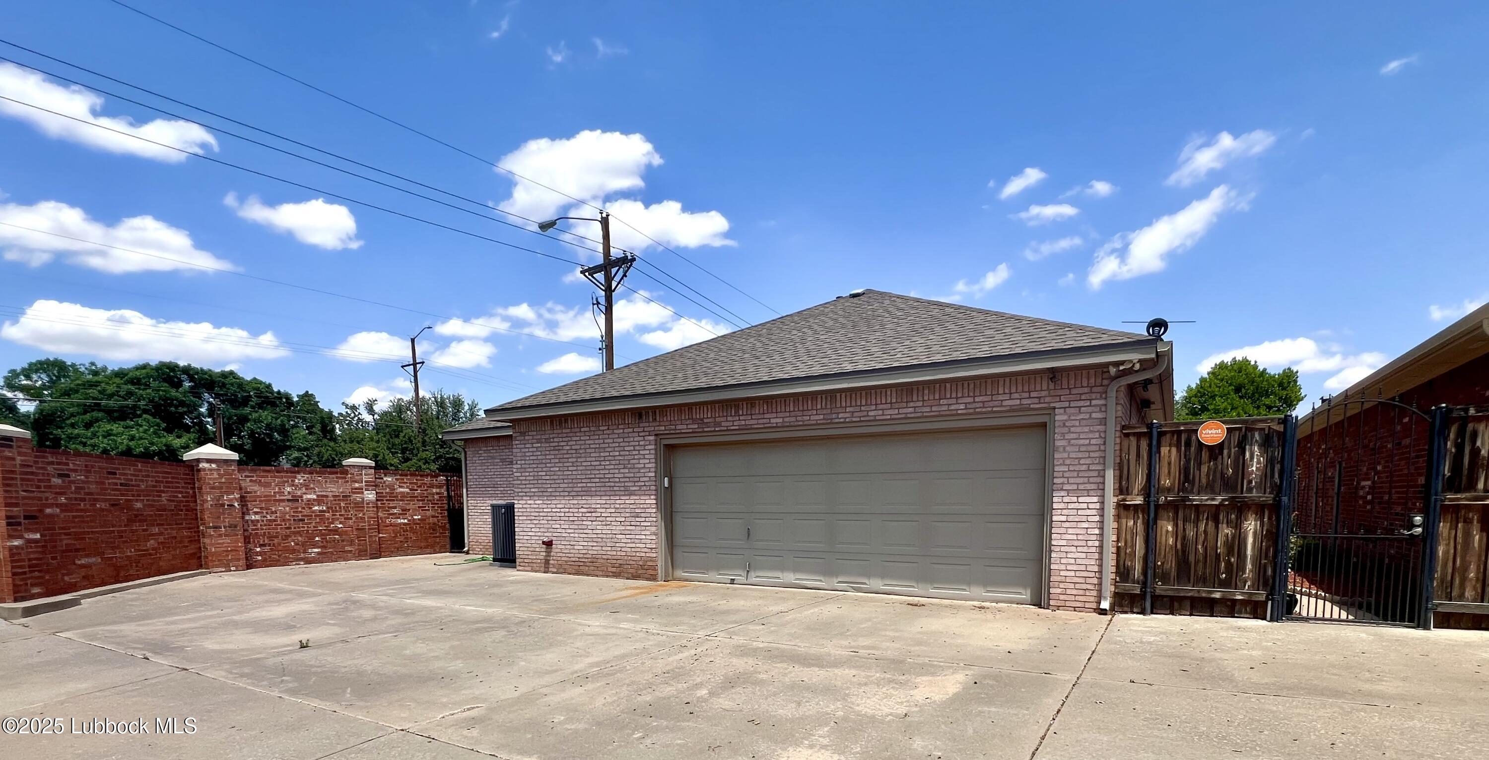 9802 Toledo Avenue Lubbock, TX 79424 - Photo 1 of 64 a front view of a house
