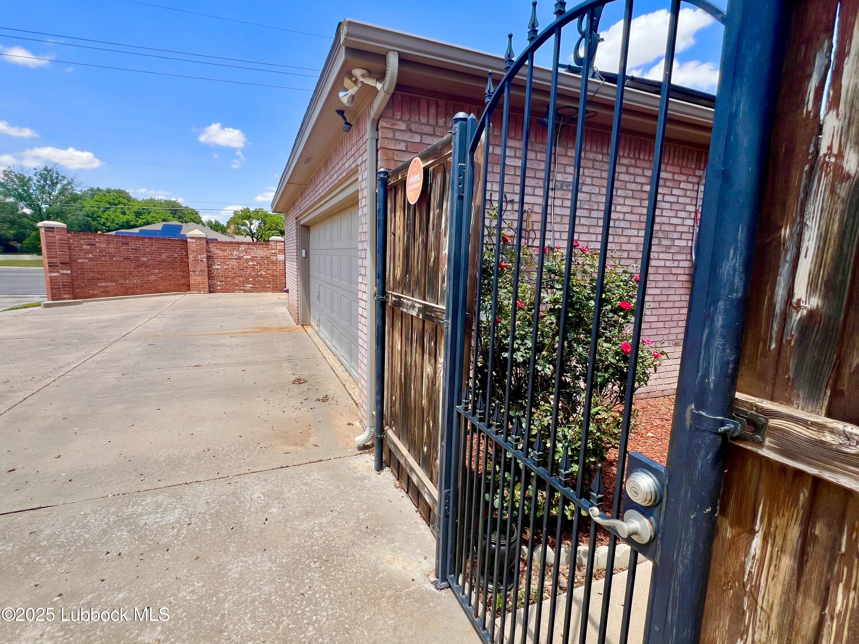 9802 Toledo Avenue Lubbock, TX 79424 - Photo 2 of 64 Rear view, 2 38 56 PM