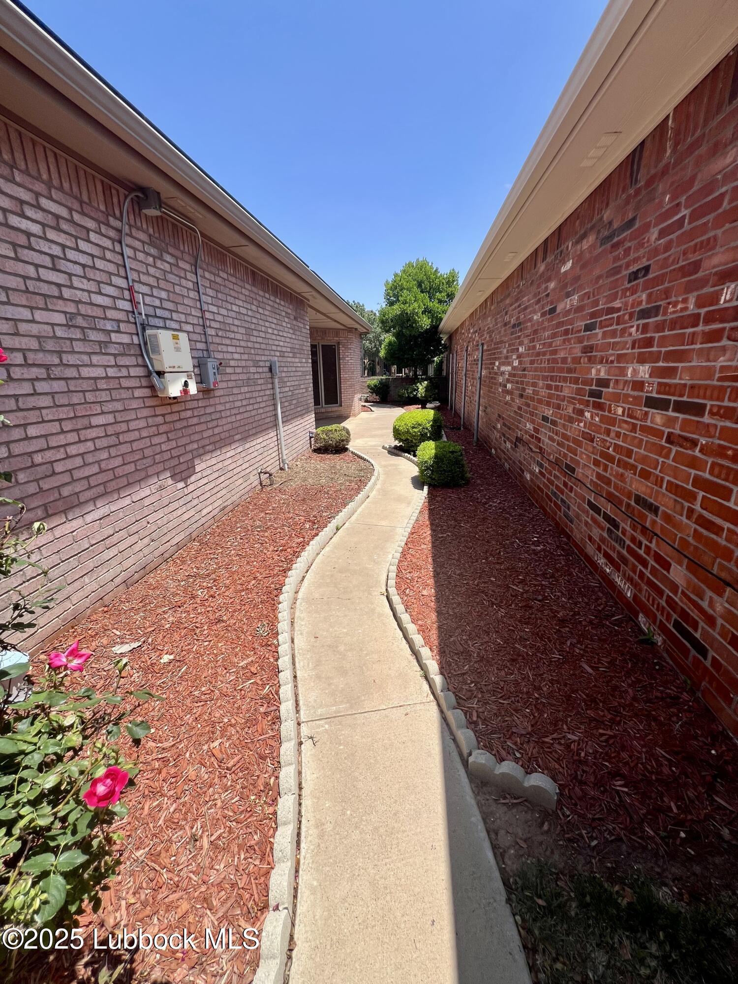 9802 Toledo Avenue Lubbock, TX 79424 - Photo 40 of 64 a house view with a backyard space