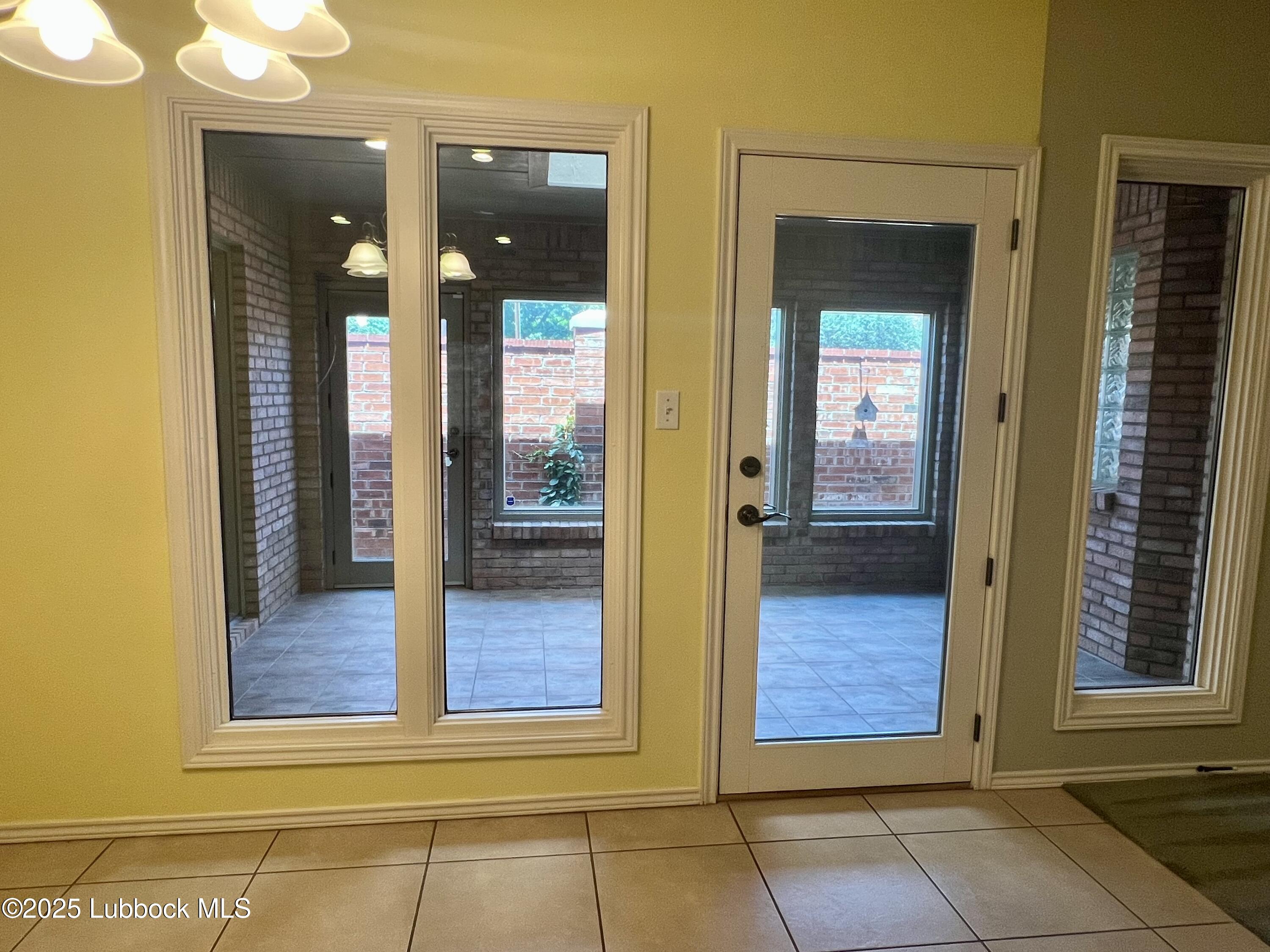 9802 Toledo Avenue Lubbock, TX 79424 - Photo 46 of 64 a view of front door of a house