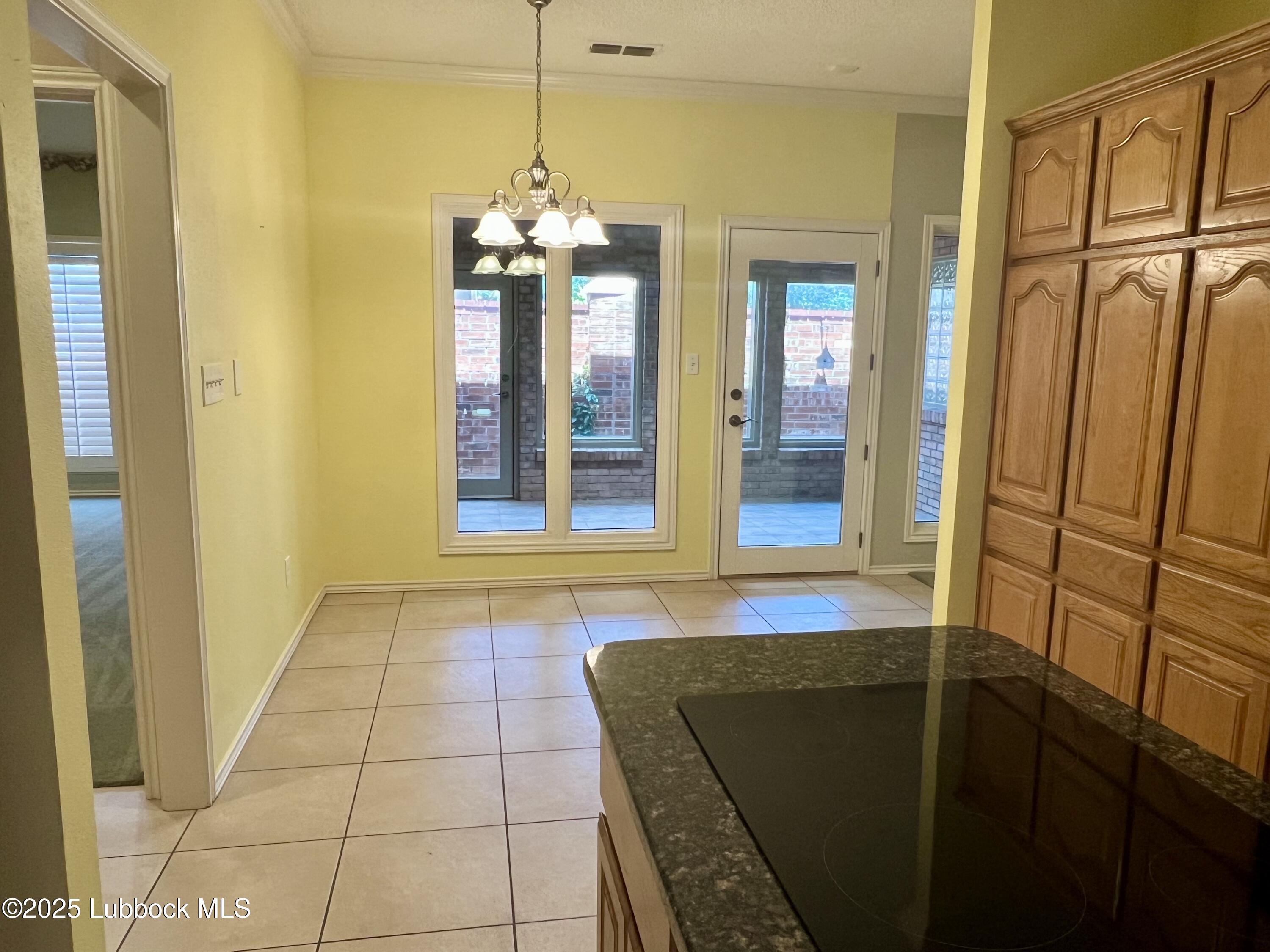 9802 Toledo Avenue Lubbock, TX 79424 - Photo 47 of 64 Kitchen nook, 2 04 07 PM