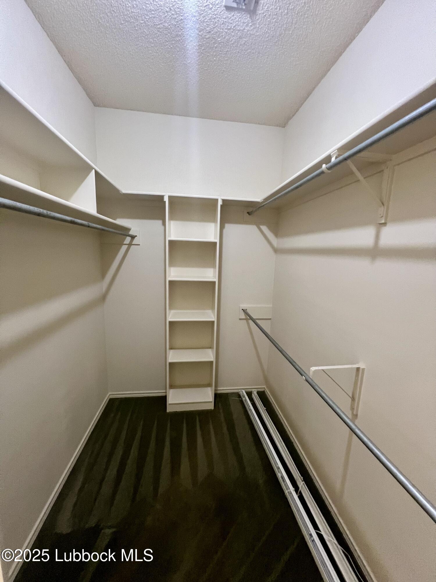 9802 Toledo Avenue Lubbock, TX 79424 - Photo 58 of 64 Master closet, 2 12 37 PM