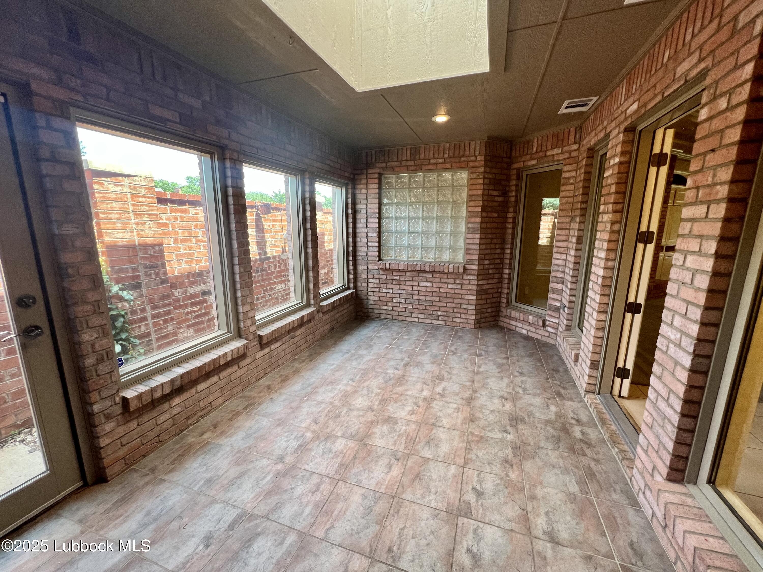 9802 Toledo Avenue Lubbock, TX 79424 - Photo 60 of 64 a view of entryway with stairs and furniture