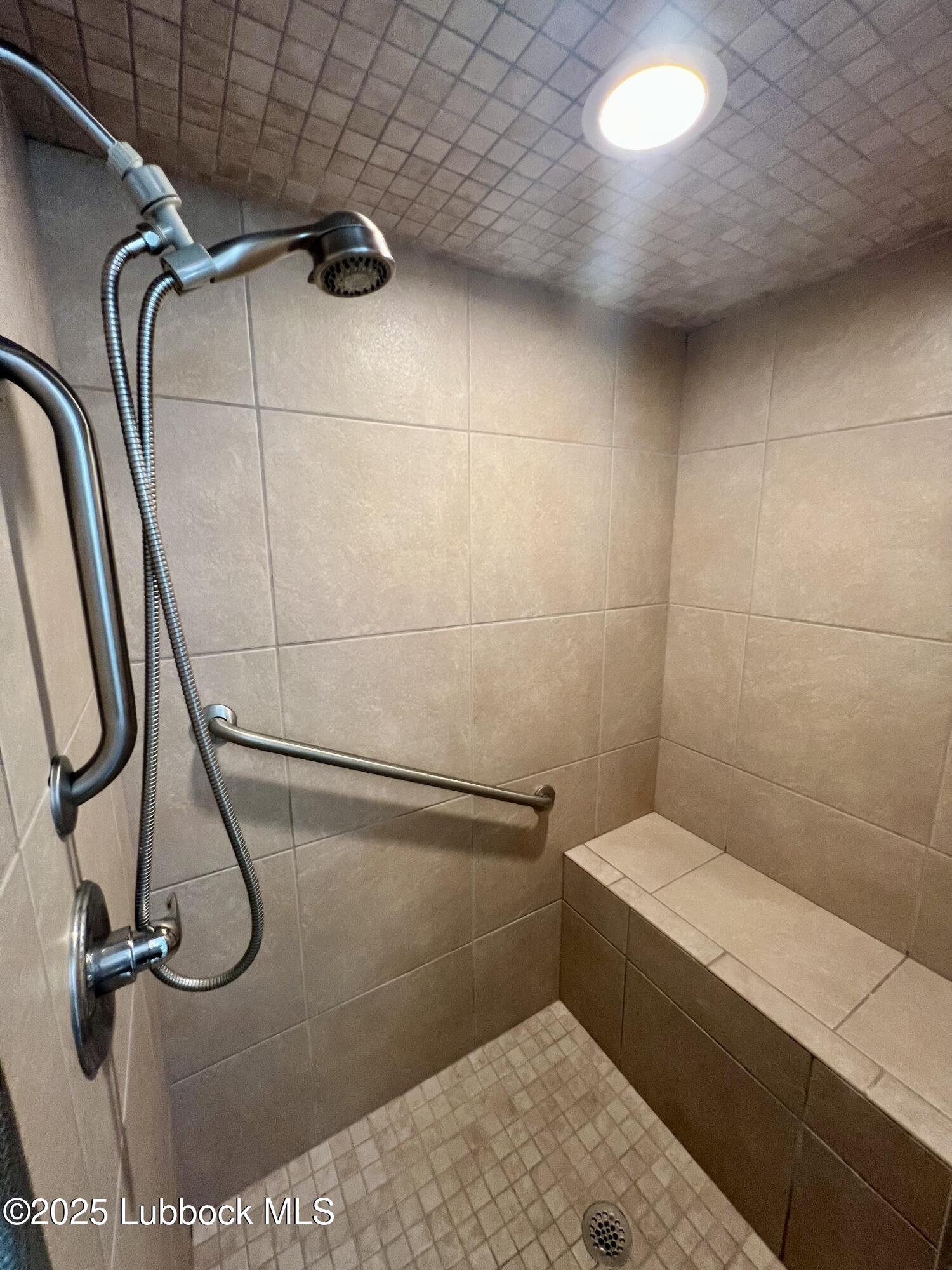 9802 Toledo Avenue Lubbock, TX 79424 - Photo 61 of 64 a bathroom with a shower