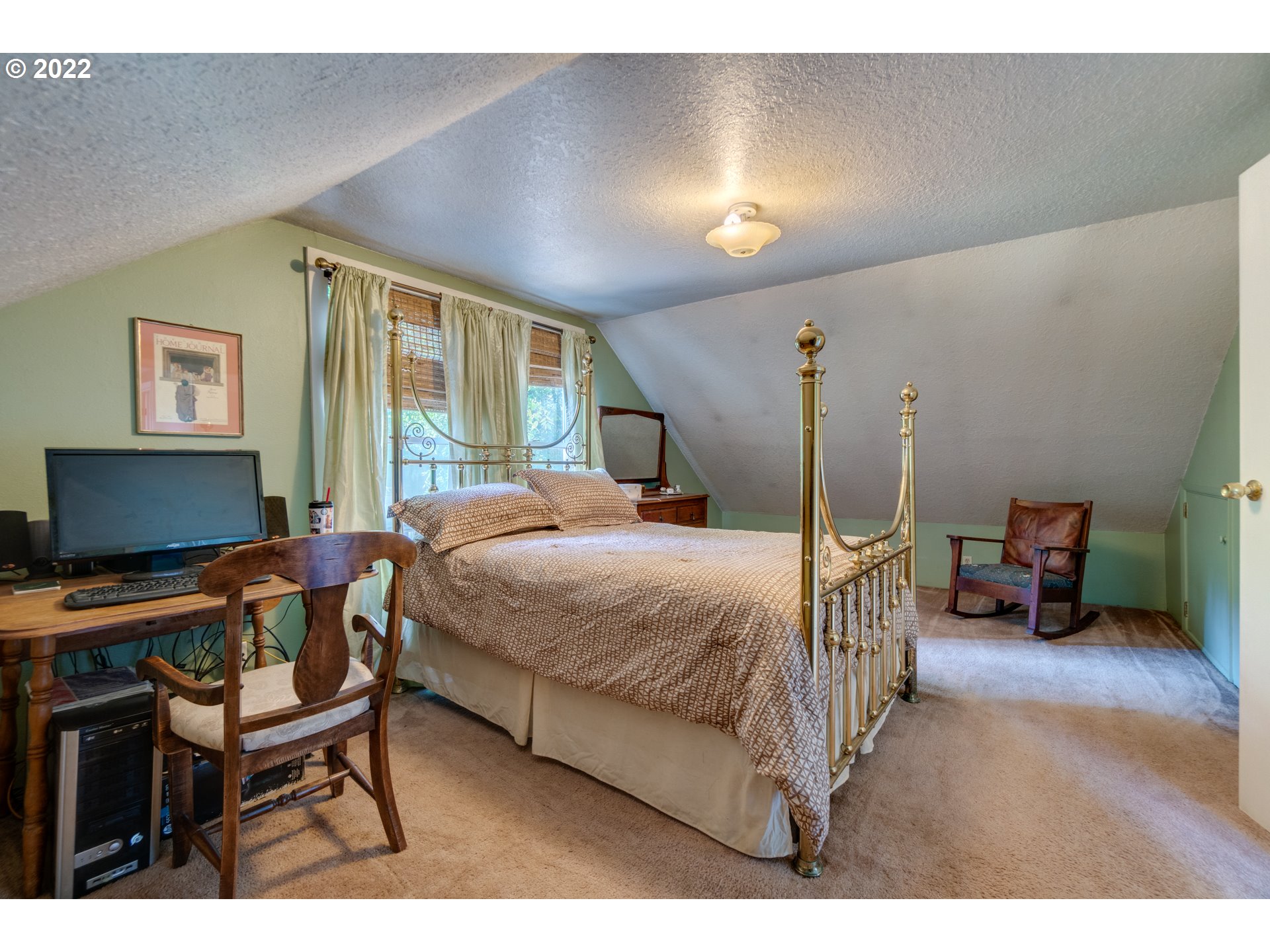 16636 Forsythe Road Oregon City, OR 97045 - Photo 17 of 29 a bedroom with a bed a desk and chair