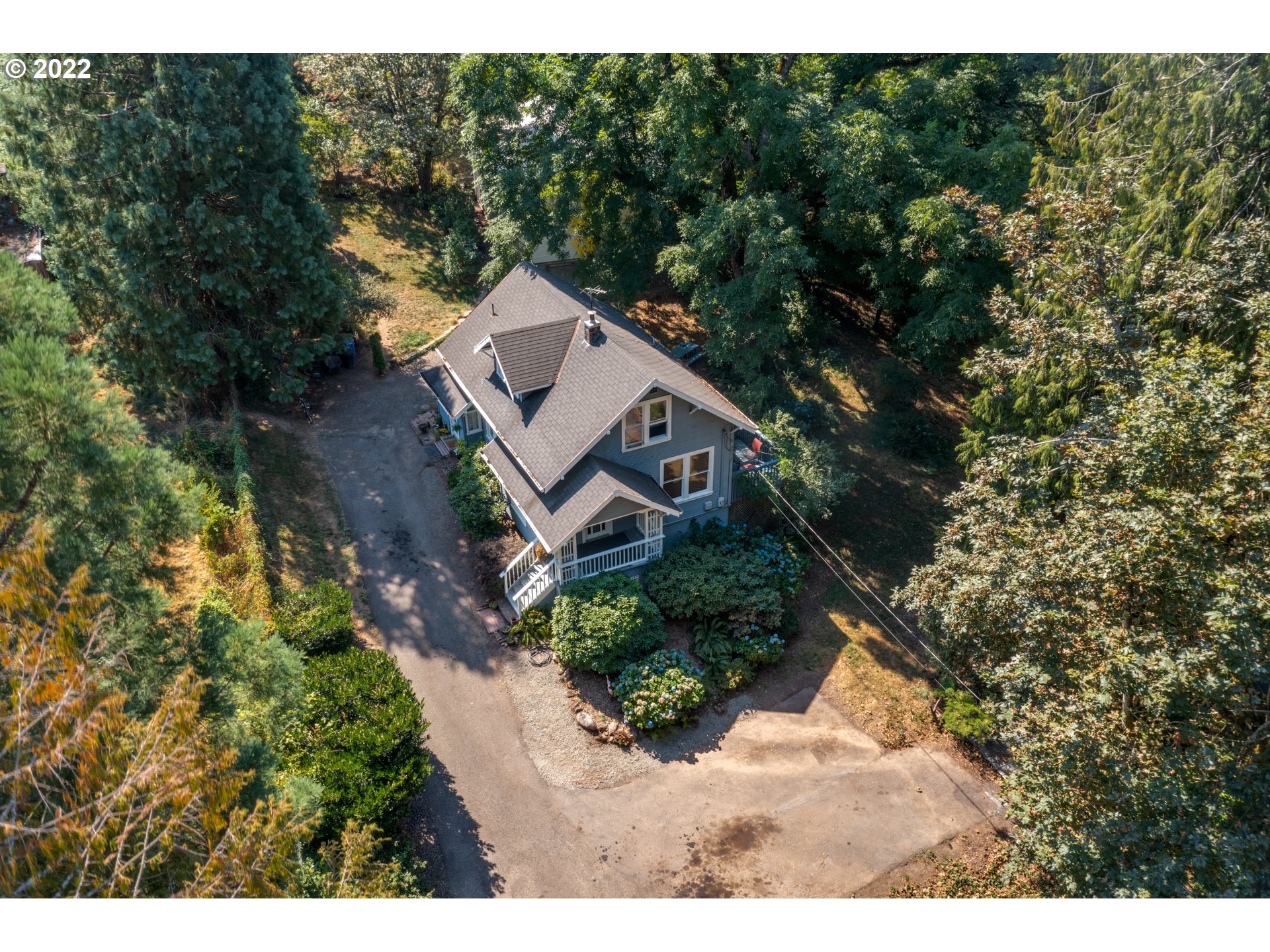 16636 Forsythe Road Oregon City, OR 97045 - Photo 25 of 29 a aerial view of a house with a yard and large trees