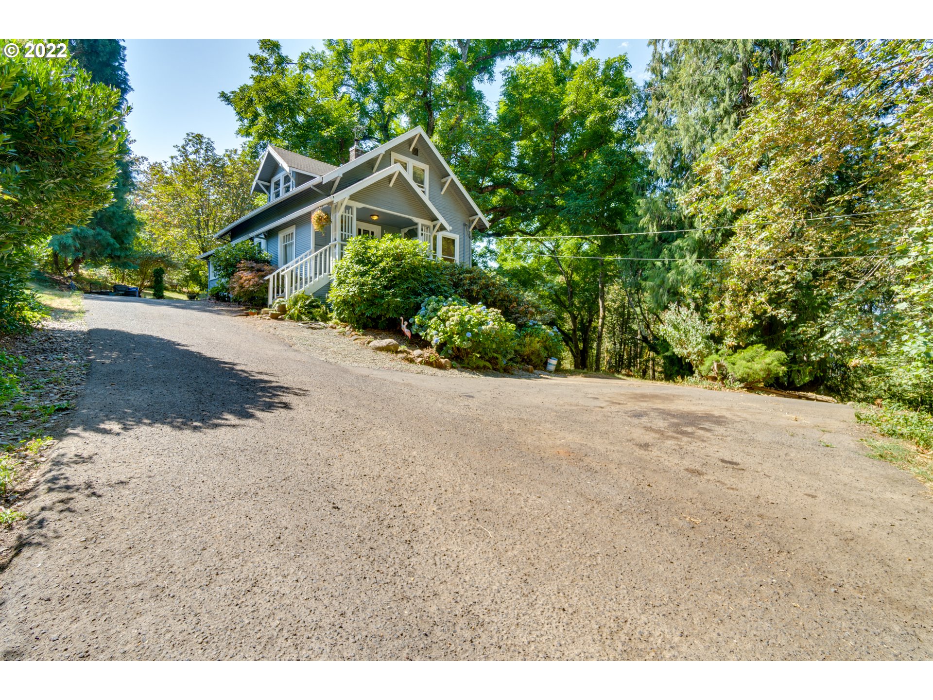 16636 Forsythe Road Oregon City, OR 97045 - Photo 4 of 29 a view of a house with a street
