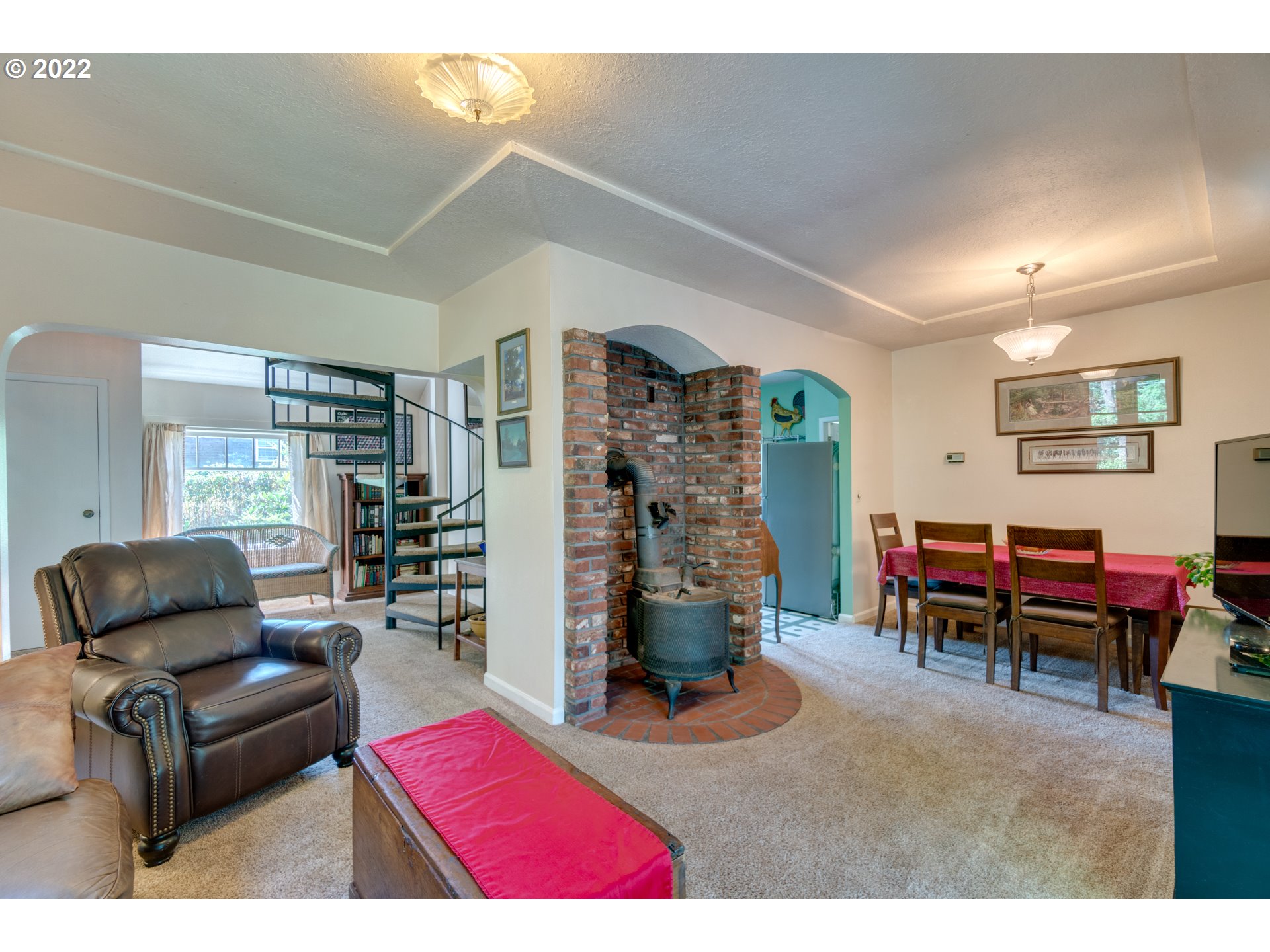 16636 Forsythe Road Oregon City, OR 97045 - Photo 6 of 29 a living room with furniture and a flat screen tv