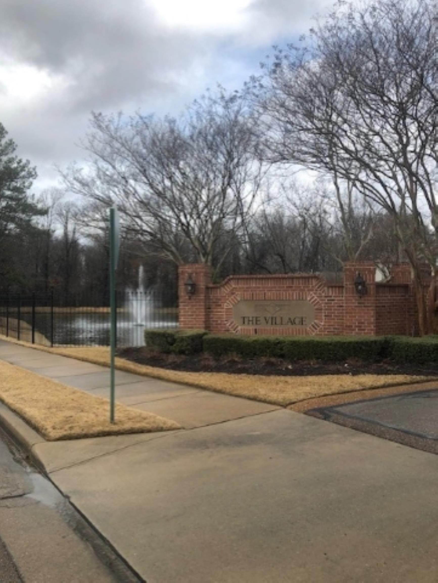 1672 Village Ridge Road, Unit 69 Collierville, TN 38017 - Photo 1 of 23 Community sign with a water view