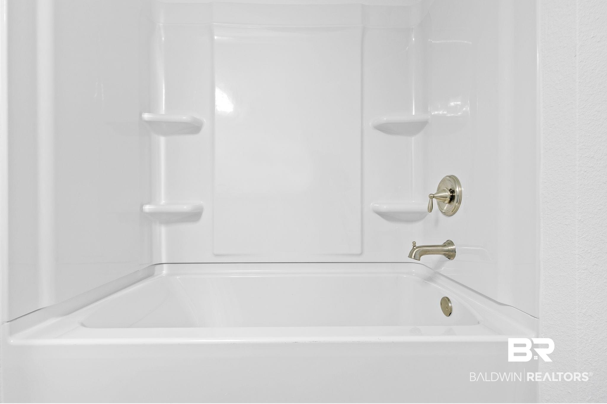16014 Alabama Avenue Silverhill, AL 36576 - Photo 24 of 50 Bathroom featuring shower / bathing tub combination