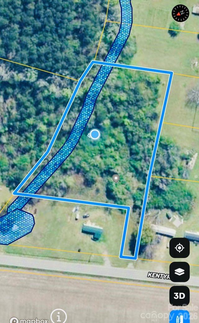 3608 Kentyre Road Hamer, SC 29547 - Photo 5 of 8 a view of backyard with wooden stairs and seating