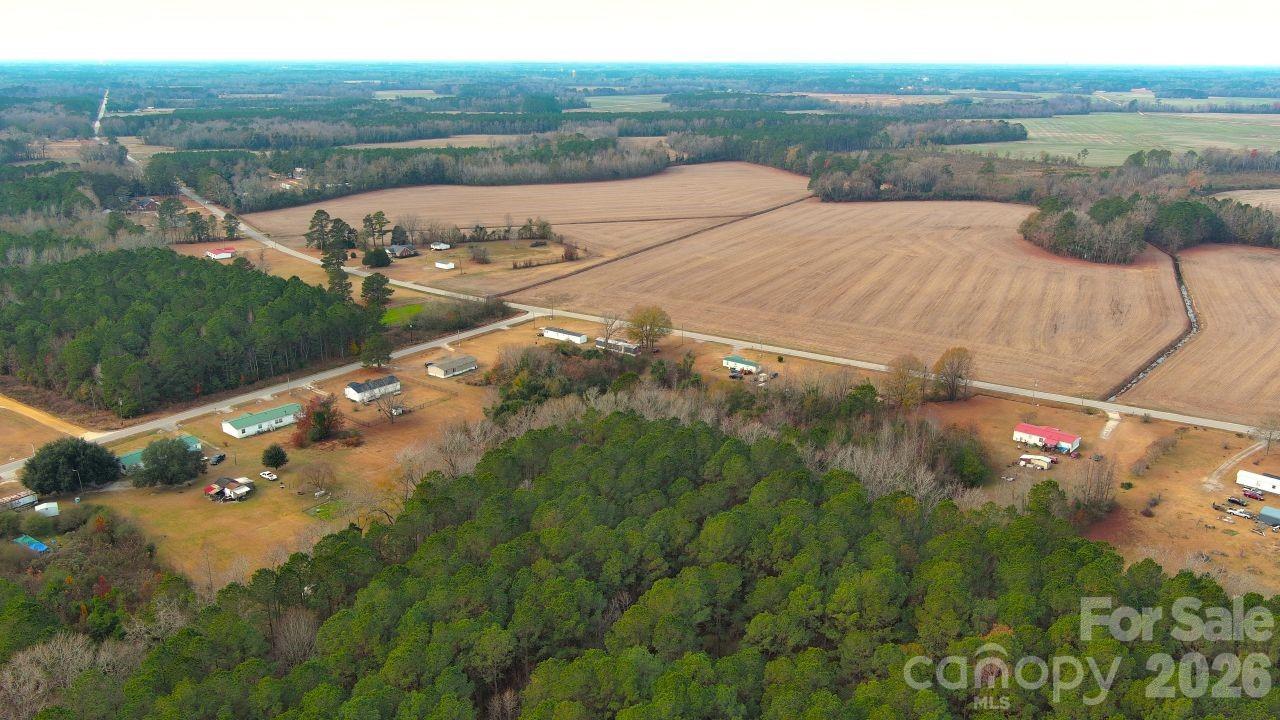 3608 Kentyre Road Hamer, SC 29547 - Photo 7 of 8 a view of a lake with a yard