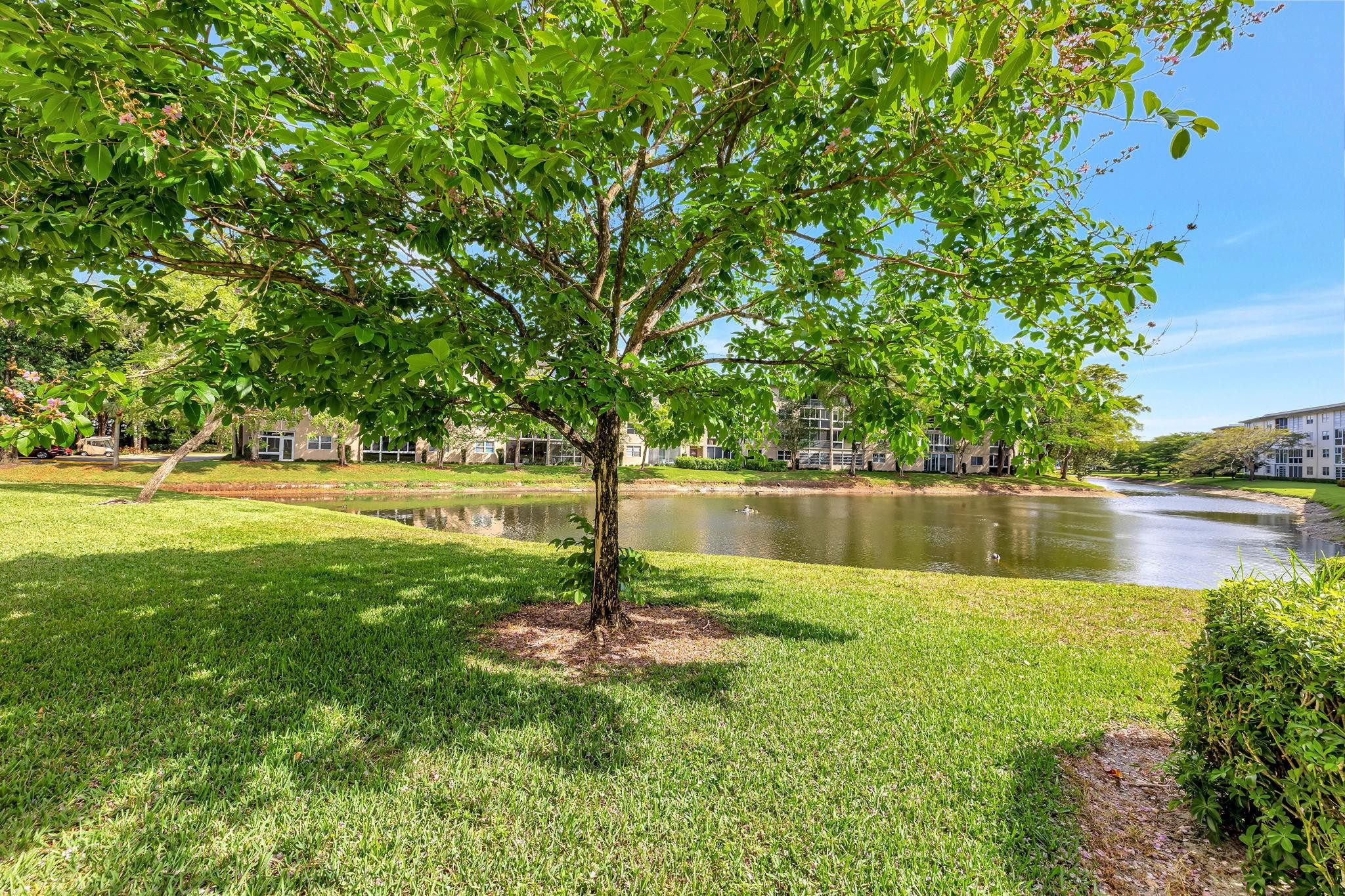 1801 Eleuthera Point, Unit E1 Coconut Creek, FL 33066 - Photo 13 of 50 a view of lake view