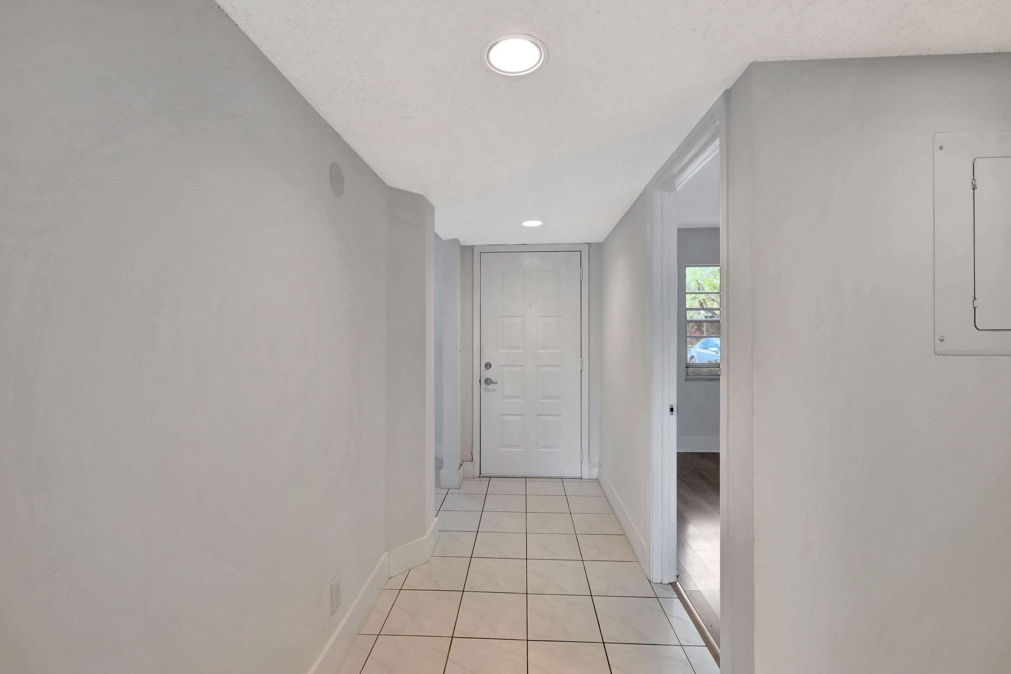 1801 Eleuthera Point, Unit E1 Coconut Creek, FL 33066 - Photo 3 of 50 a view of an empty room