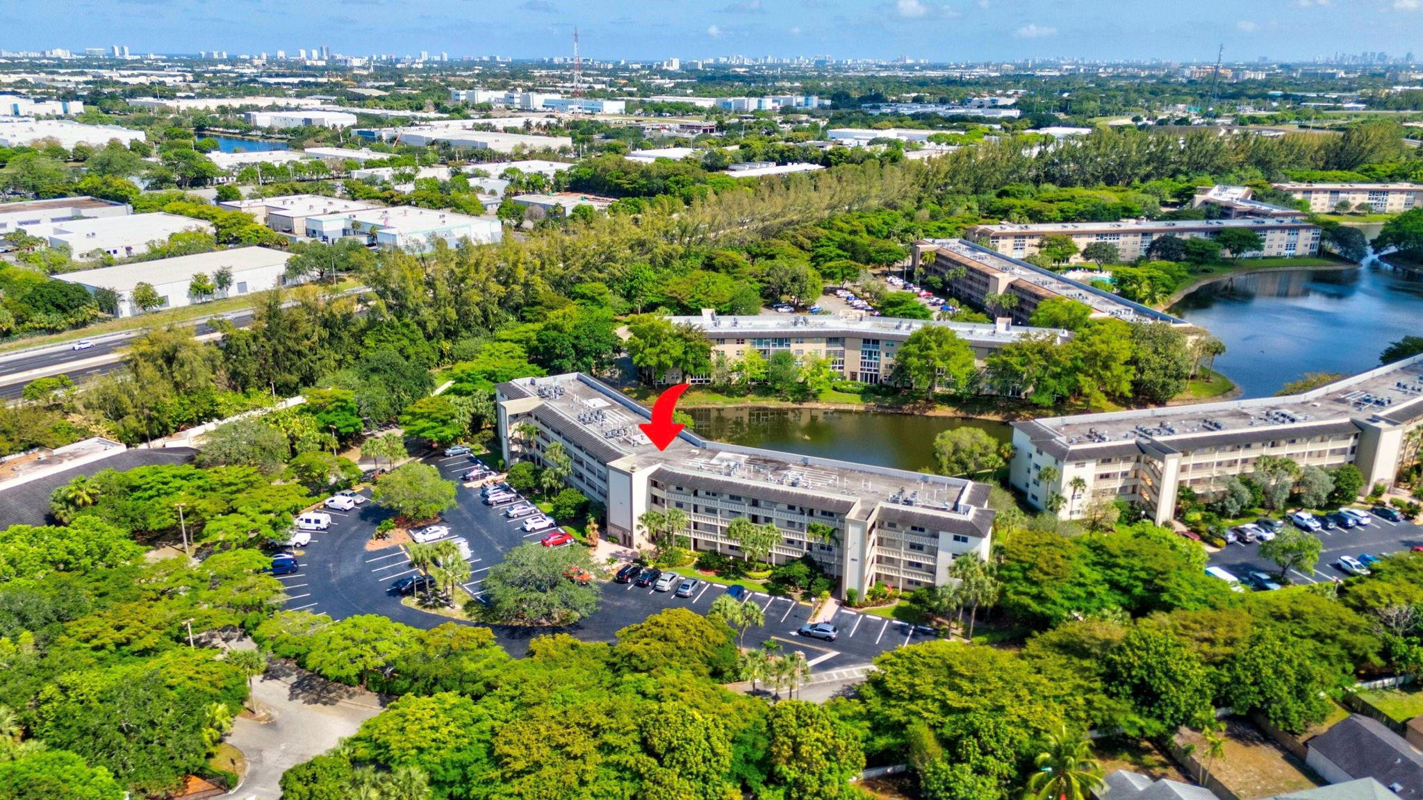 1801 Eleuthera Point, Unit E1 Coconut Creek, FL 33066 - Photo 33 of 50 an aerial view of houses with yard