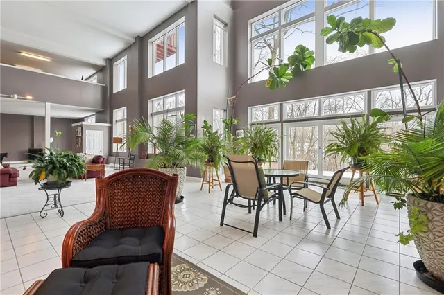 a view of dinning table and chairs in patio