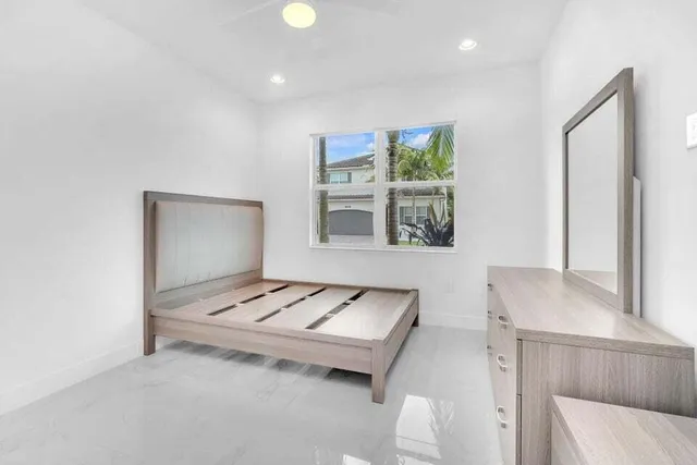 a living room with furniture and window
