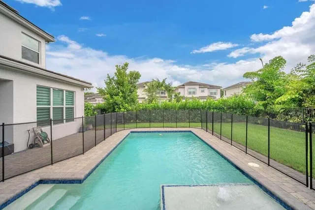 a view of a backyard with a garden