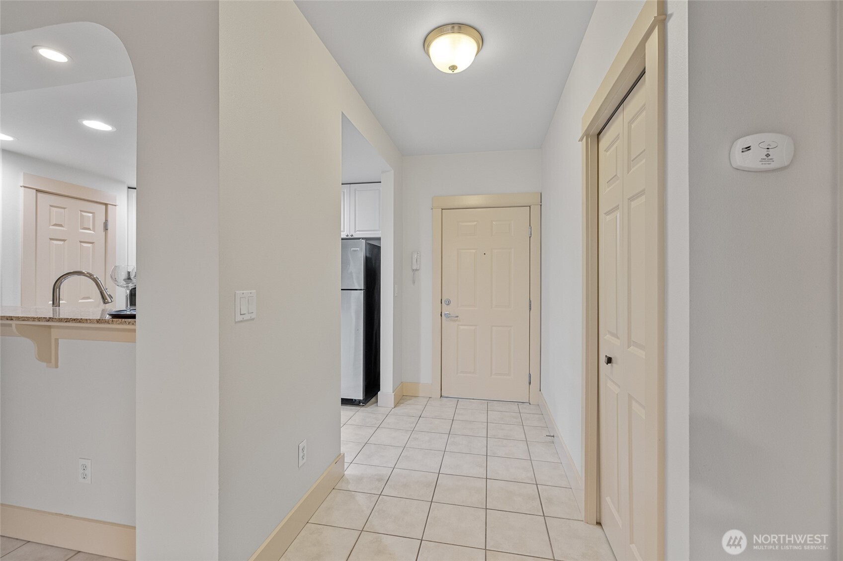 1419 Digby Place, Unit 207 Mount Vernon, WA 98274 - Photo 4 of 31 a view of a livingroom with a chandelier