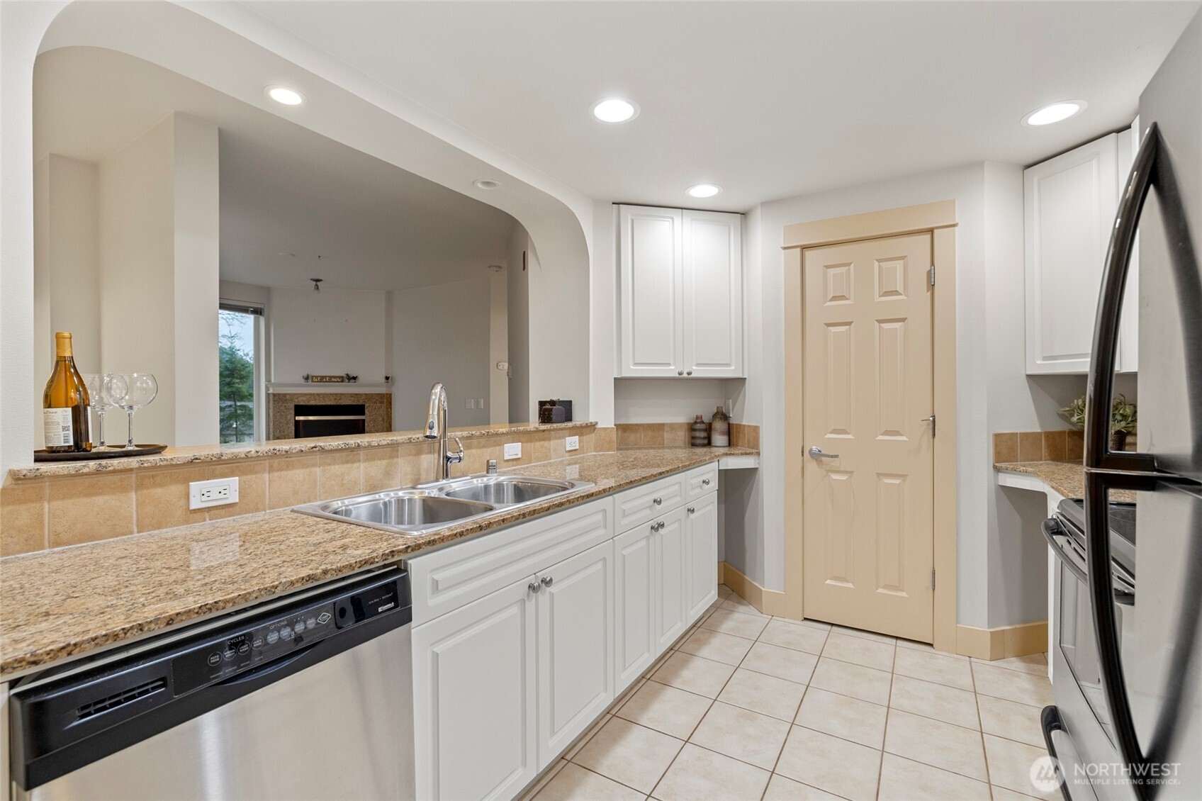 1419 Digby Place, Unit 207 Mount Vernon, WA 98274 - Photo 5 of 31 a kitchen with a sink appliances and cabinets