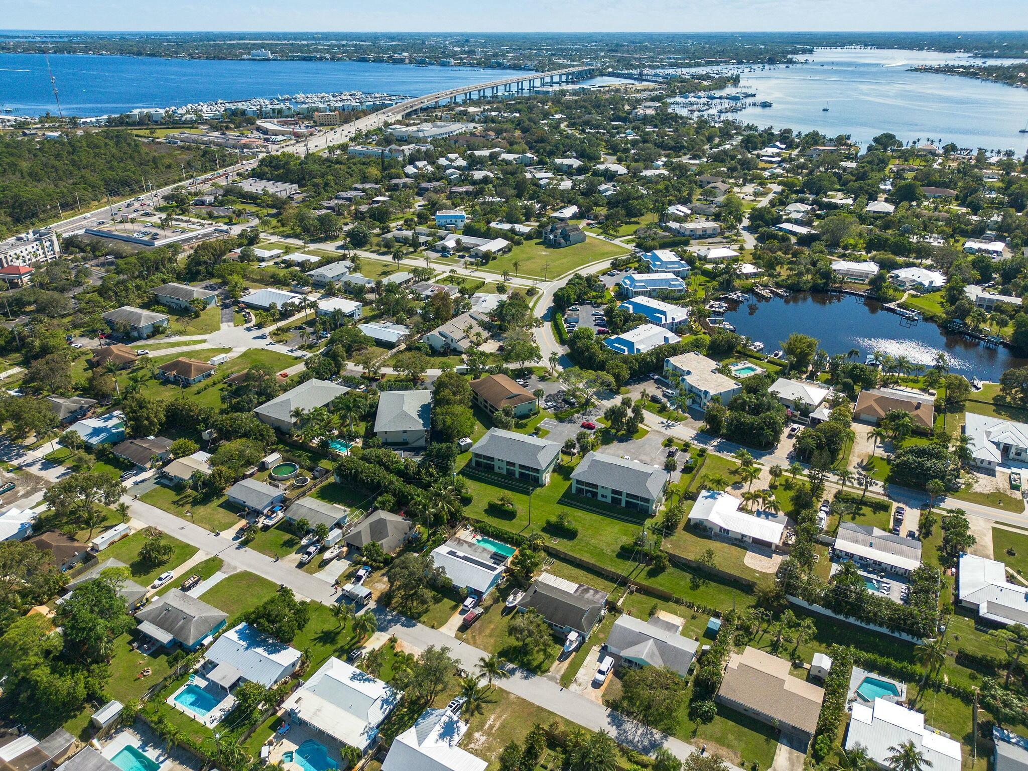 983 Northwest Spruce Ridge Drive, Unit 2 Stuart, FL 34994 - Photo 41 of 55 an aerial view of multiple house