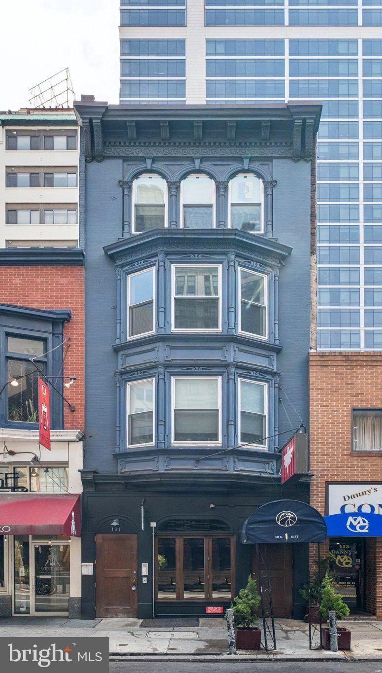 131 South 13th Street, Unit 3F Philadelphia, PA 19107 - Photo 13 of 14 a front view of a building with street view