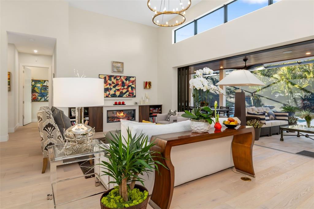 1879 Hibiscus Street Sarasota, FL 34239 - Photo 25 of 84 a living room with furniture and a large window