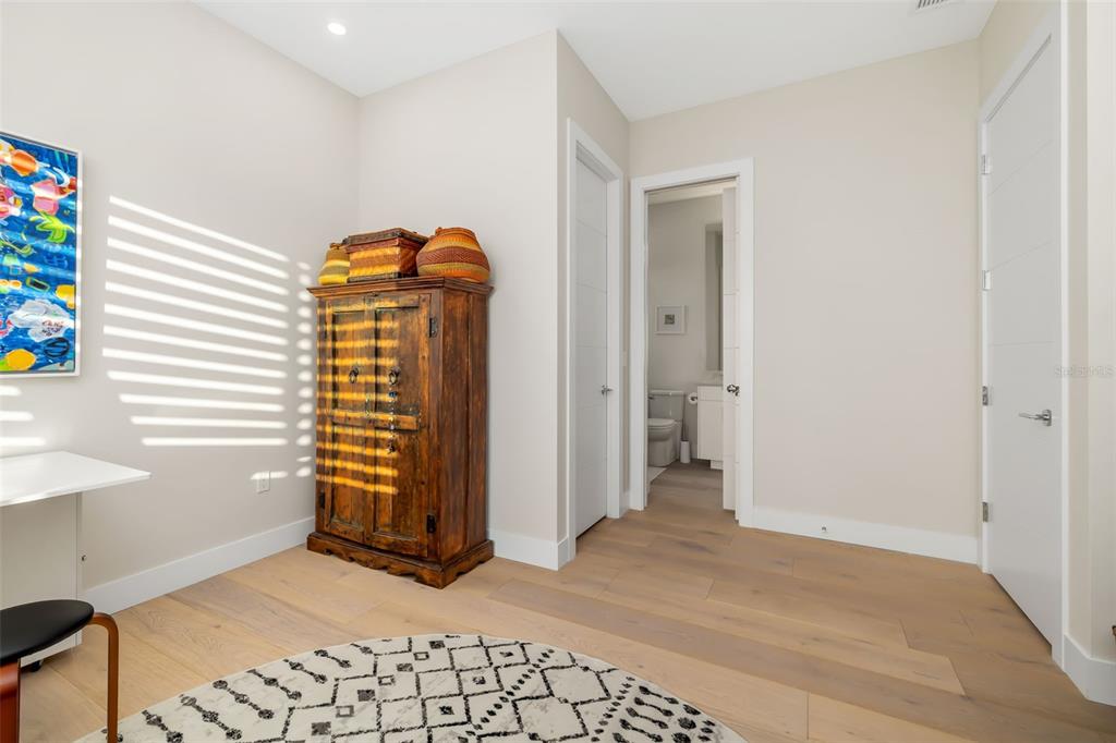 1879 Hibiscus Street Sarasota, FL 34239 - Photo 53 of 84 a view of a livingroom with wooden floor and a window