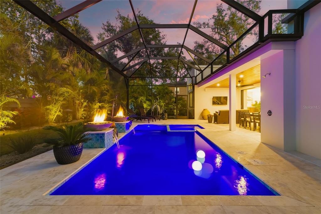 1879 Hibiscus Street Sarasota, FL 34239 - Photo 59 of 84 a view of swimming pool with red chairs