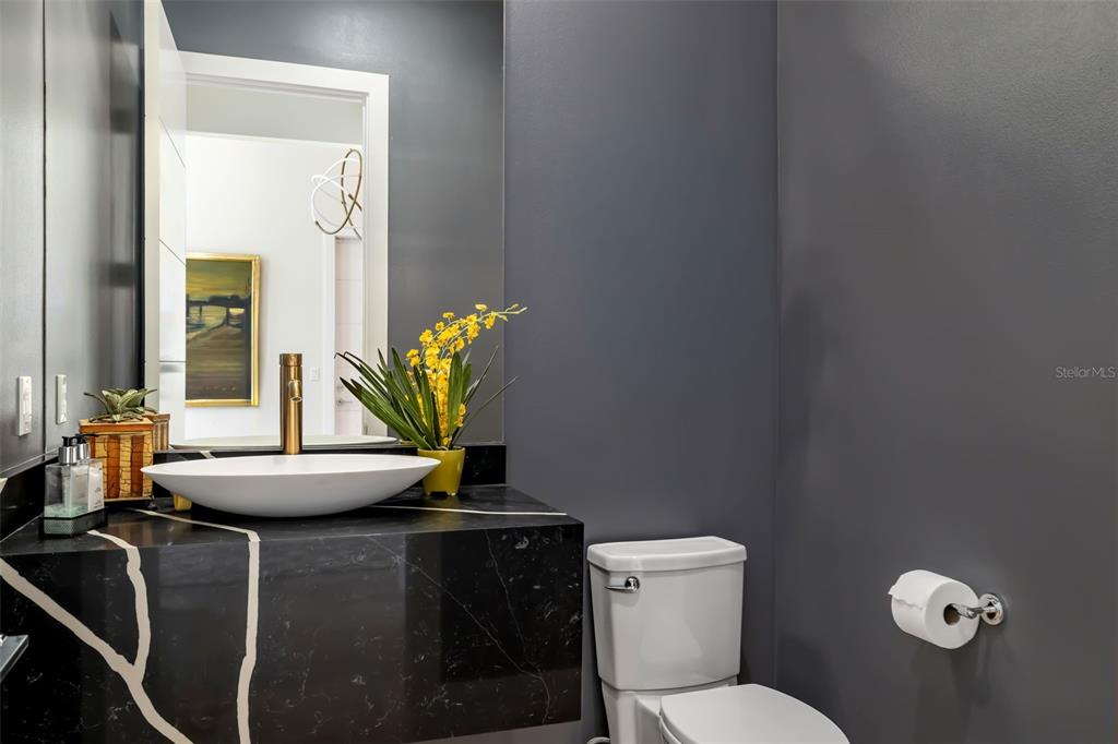 1879 Hibiscus Street Sarasota, FL 34239 - Photo 10 of 84 a bathroom with a toilet