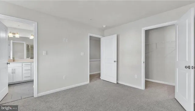 wooden floor and closet in a room
