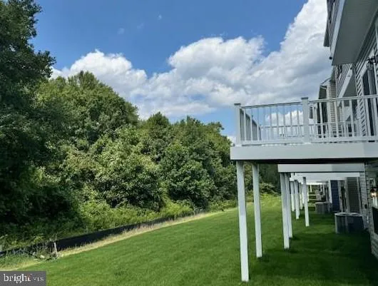 a view of house with front yard