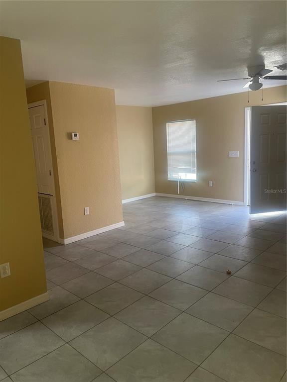 512 Valencia Street Sebring, FL 33870 - Photo 5 of 13 en empty room with windows
