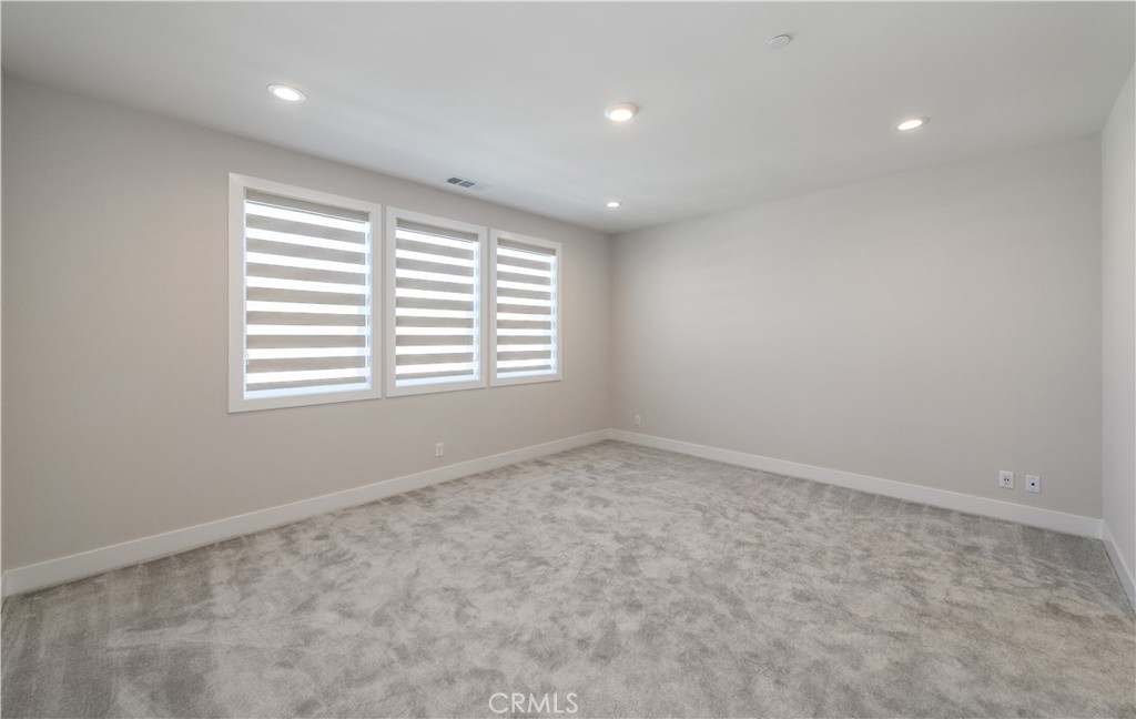 240 Longden Lake Forest, CA 92630 - Photo 16 of 32 an empty room with a window