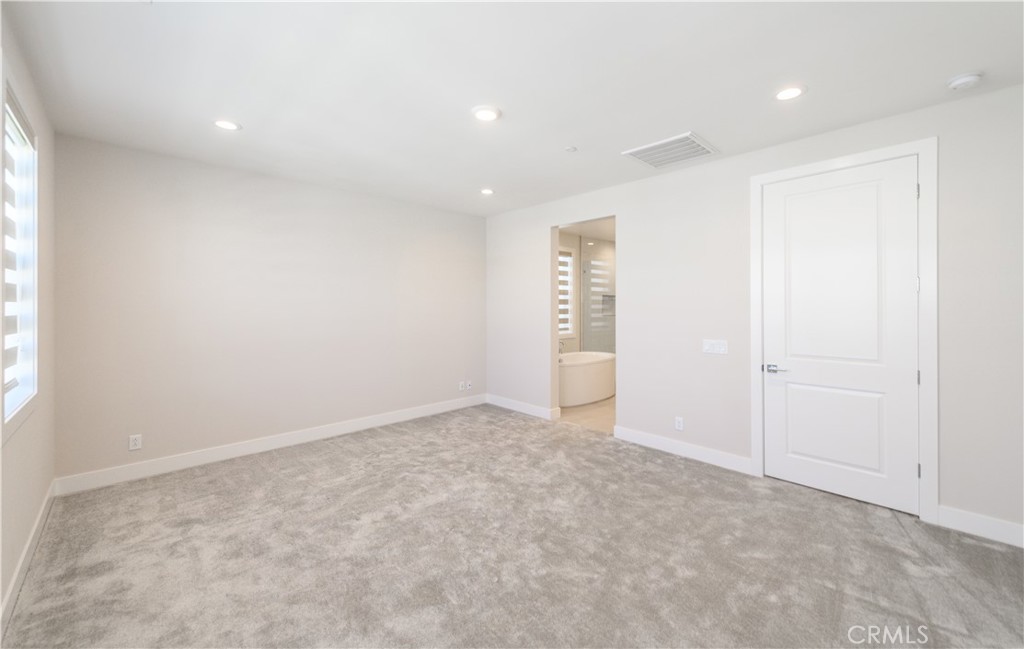 240 Longden Lake Forest, CA 92630 - Photo 17 of 32 an empty room with windows