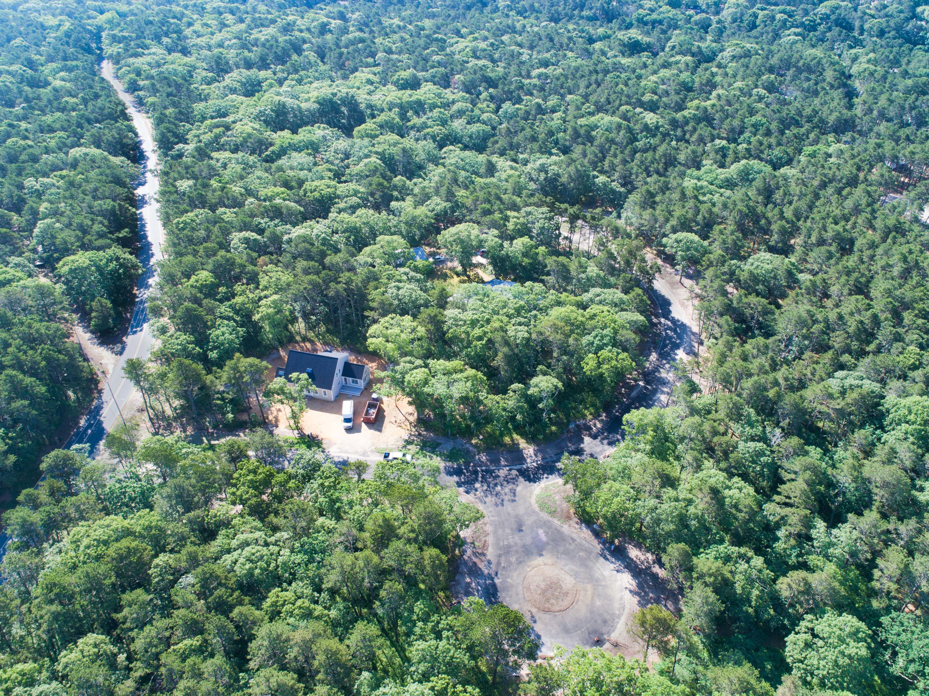 18 Sam Hollow Road Wellfleet, MA 02667 - Photo 3 of 6 an aerial view of a house with a yard