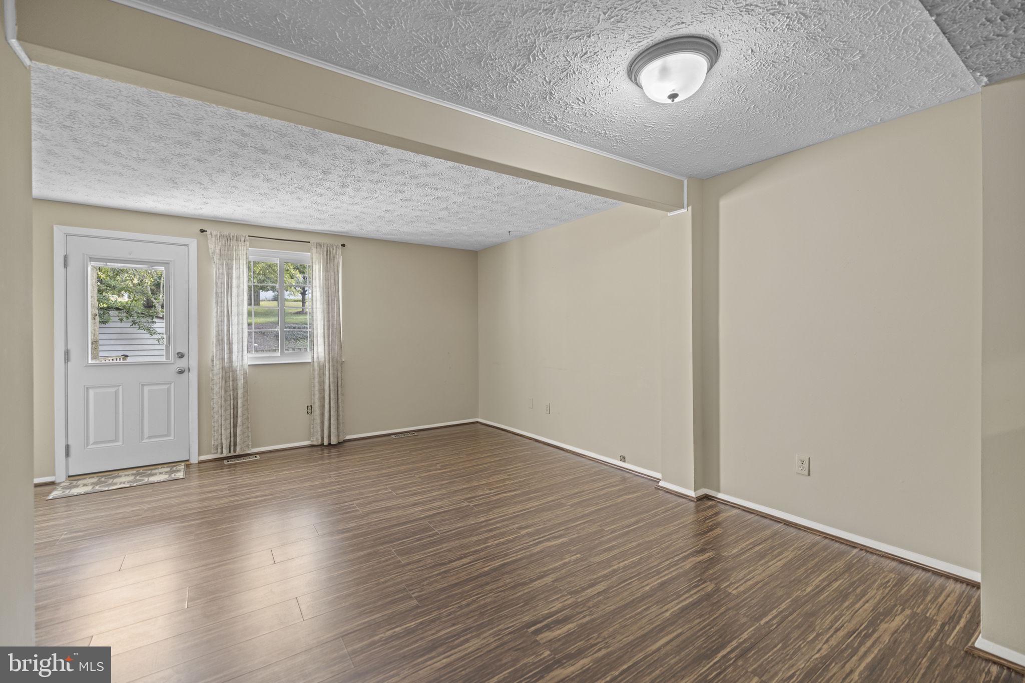 8339 Brookvale Court Springfield, VA 22153 - Photo 8 of 34 Living & dining room