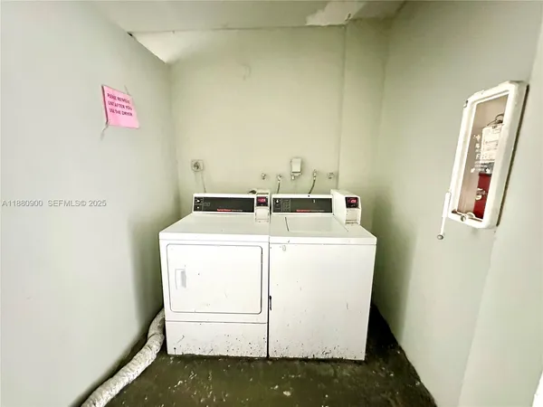 a black and white building with glass windows