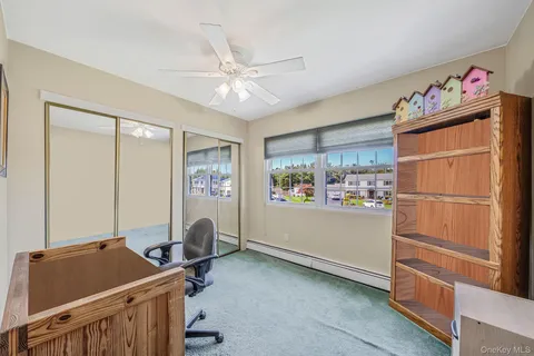 a room with furniture and a window