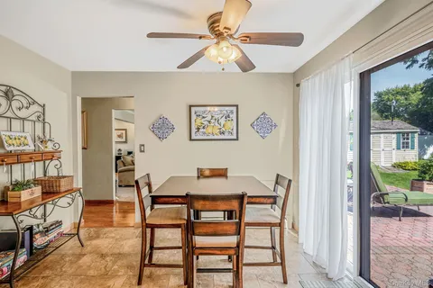 a view of a livingroom with furniture and window