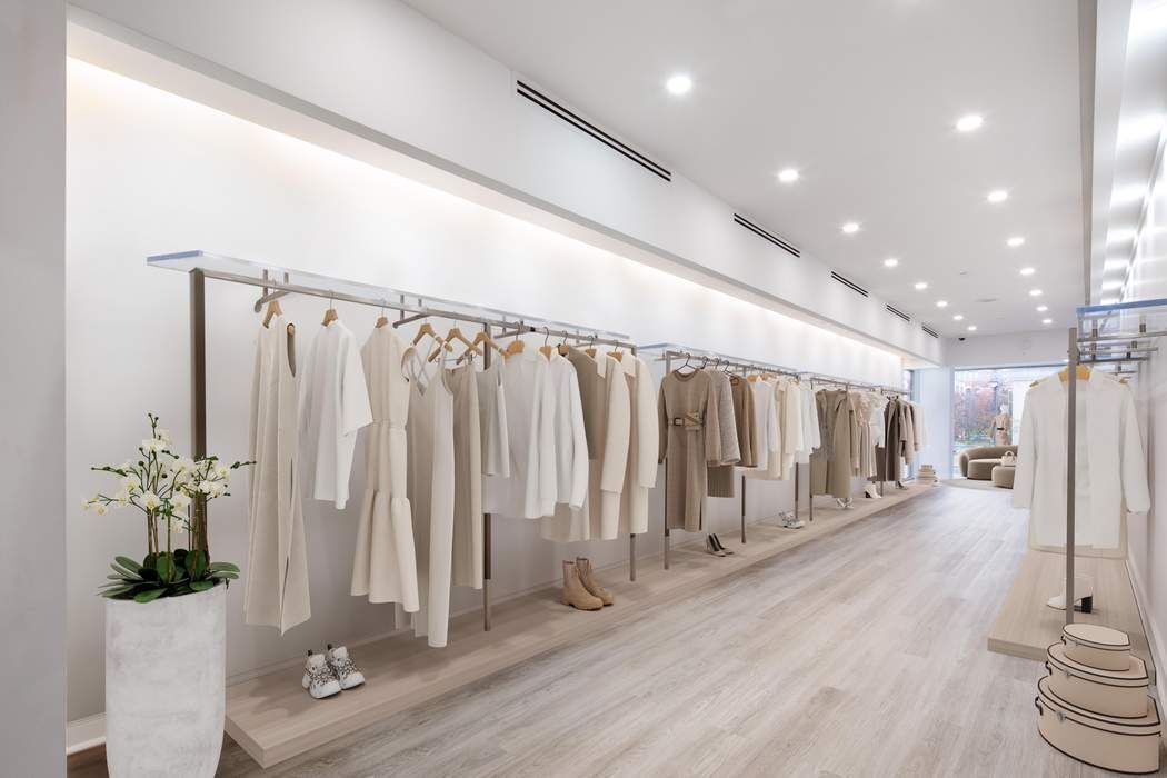 770 Madison Avenue Manhattan, NY 10065 - Photo 3 of 17 a view of a hallway with wooden floor and stairs