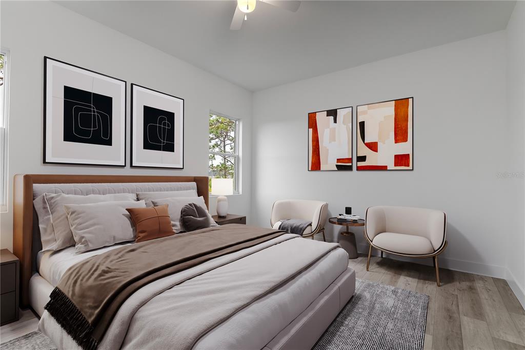 13514 Keystone Boulevard Port Charlotte, FL 33981 - Photo 14 of 42 a bedroom with a bed and a painting on the wall