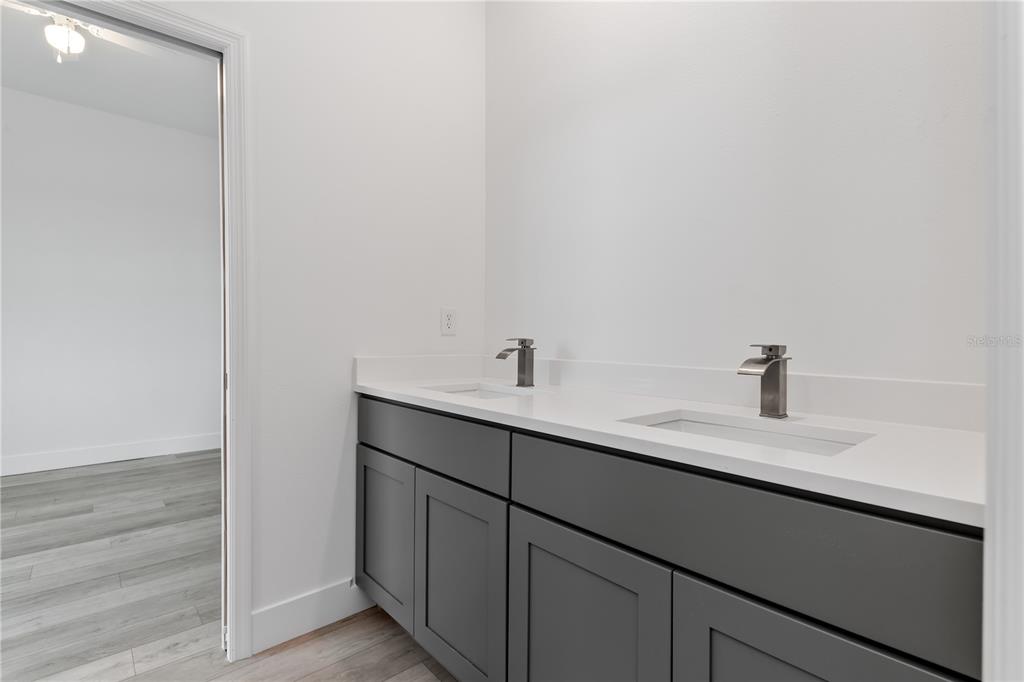 13514 Keystone Boulevard Port Charlotte, FL 33981 - Photo 26 of 42 a sink with a vanity