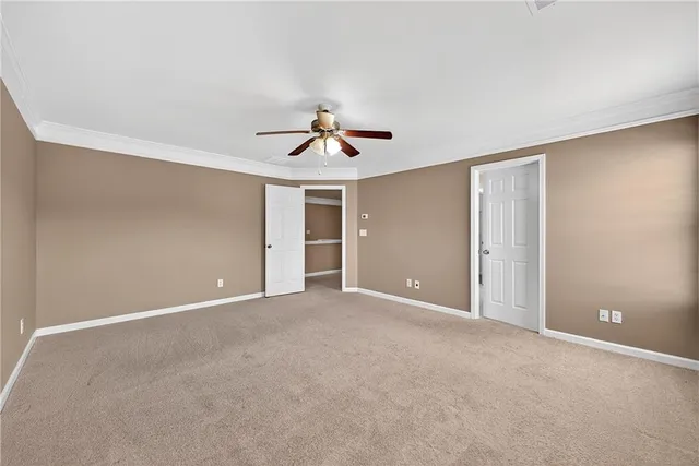 a bathroom with a tub a sink and a mirror