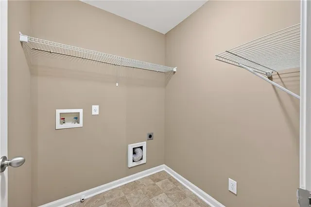 a bathroom with a sink toilet vanity and shower