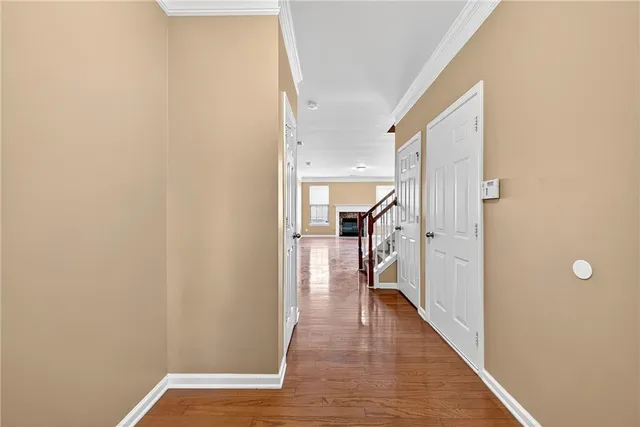 a view of a kitchen with a sink and a fireplace