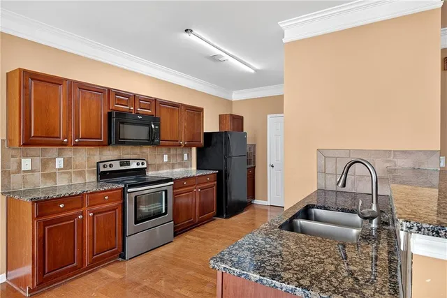 a bathroom with a toilet a sink and a mirror