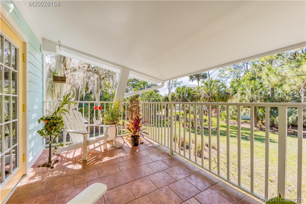 669 Southwest Linden Street Stuart, FL 34997 - Photo 43 of 43 GUEST HOUSE TILED AND COVERED BALCONY AREA