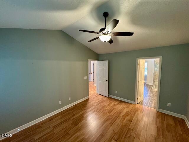813 St Catherines Drive Wake Forest, NC 27587 - Photo 13 of 16 an empty room with wooden floor and windows